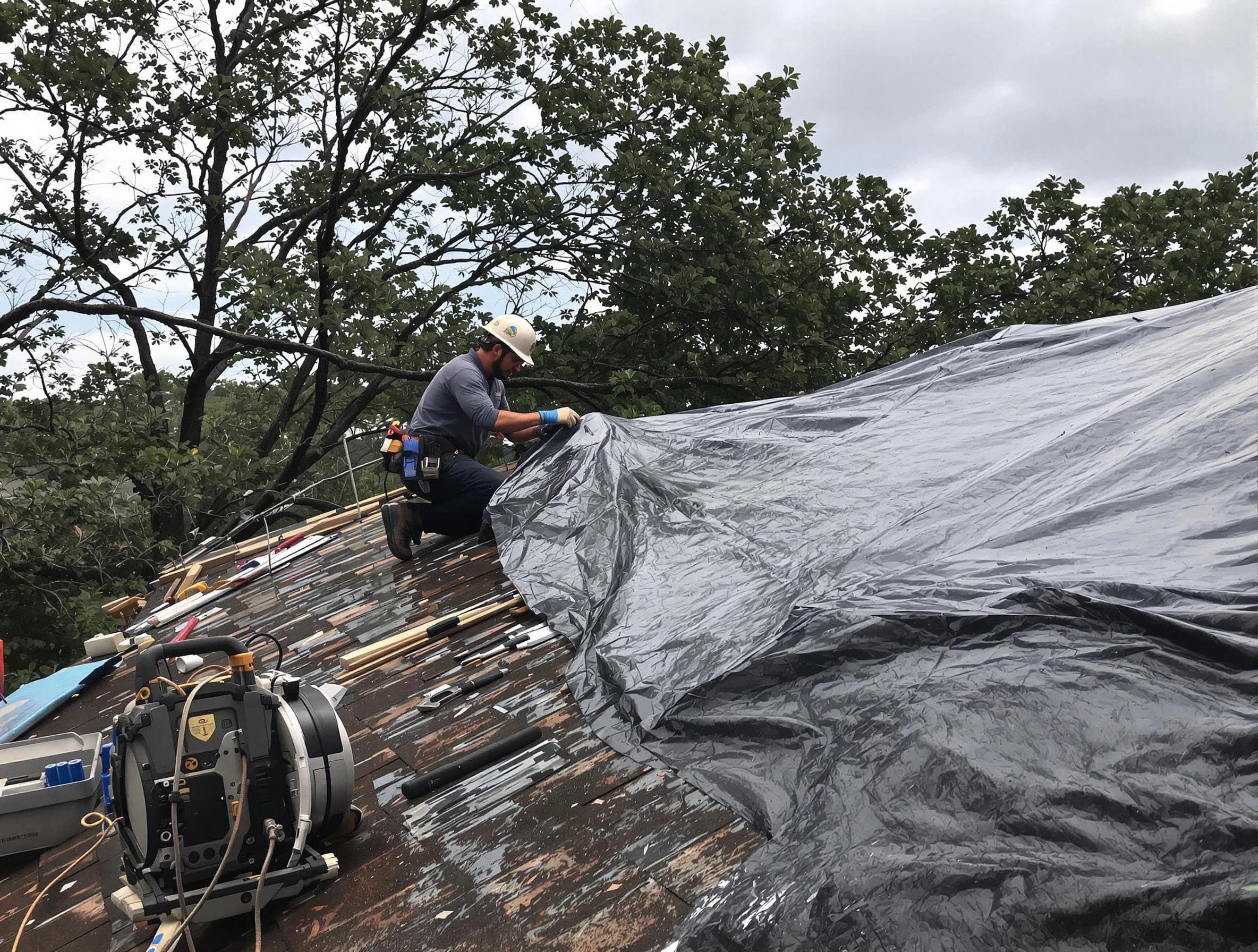 Elyria Roofing Company responding to an emergency roof repair call in Elyria, OH