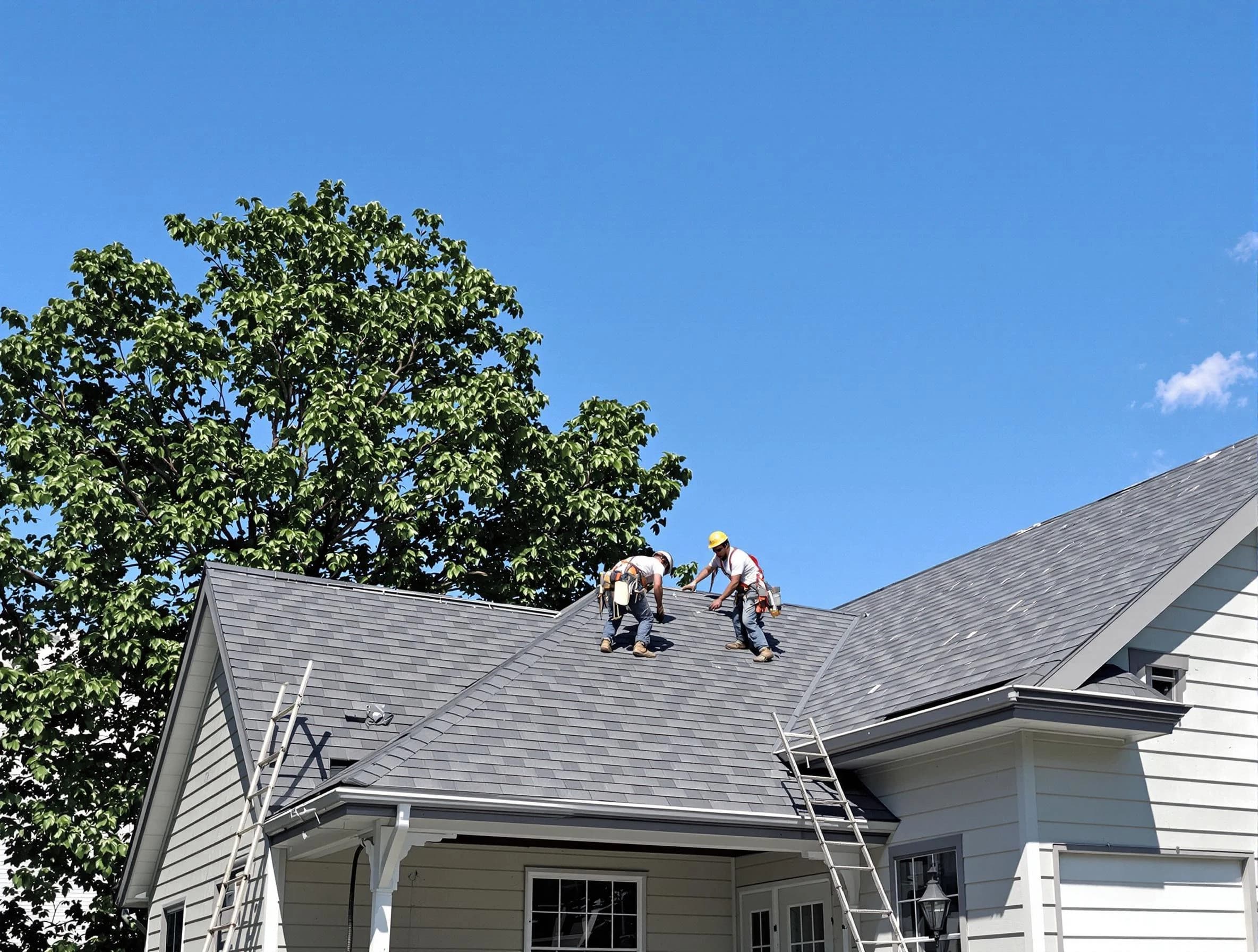 Elyria Roofing Company crew finalizing a roof installation in Elyria, OH