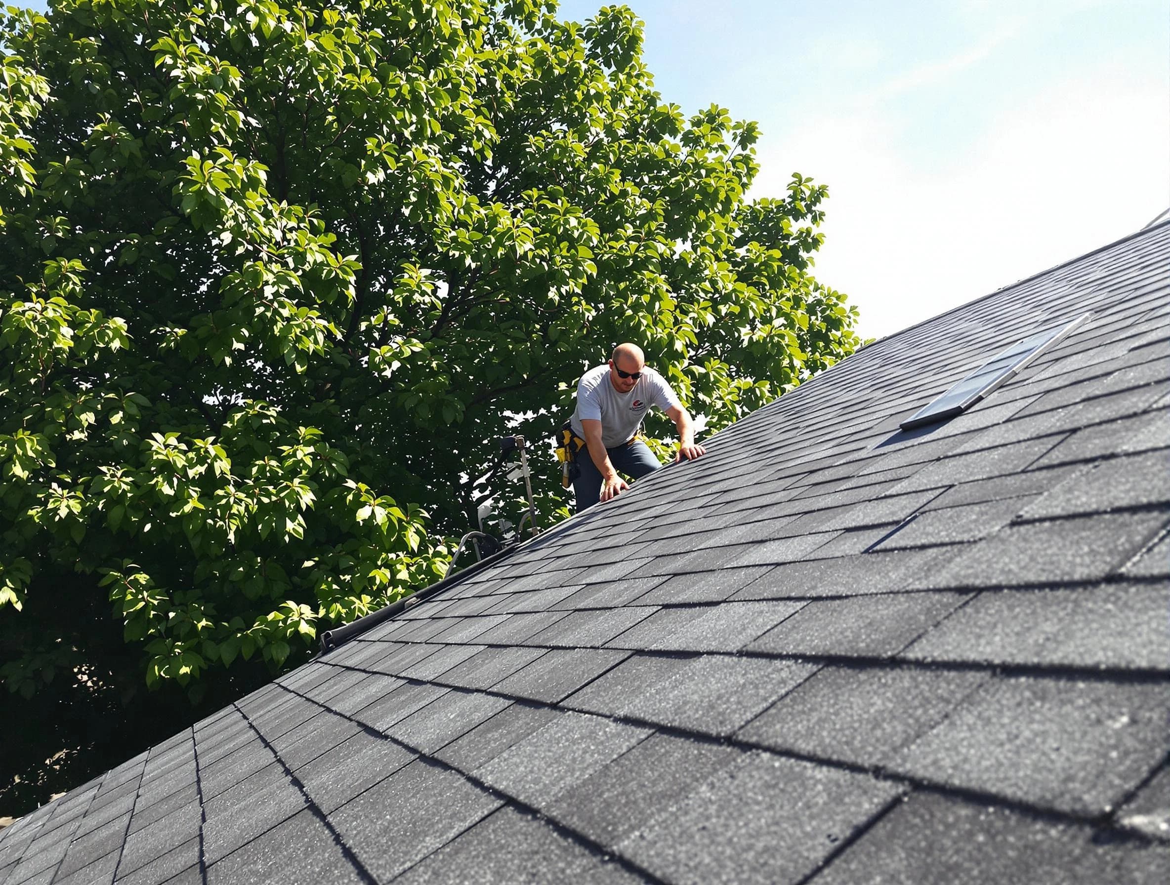 Certified roofers from Elyria Roofing Company working in Elyria, OH